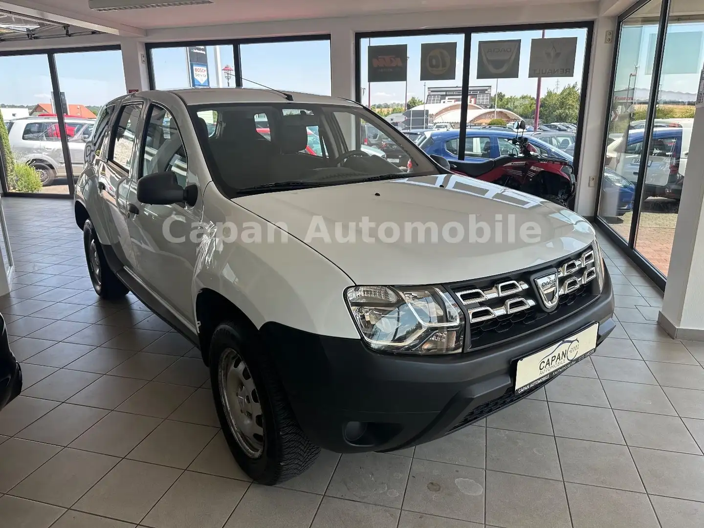 Dacia Duster I Essentiel 4x2 WenigKM/AHK/EURO6 Weiß - 1
