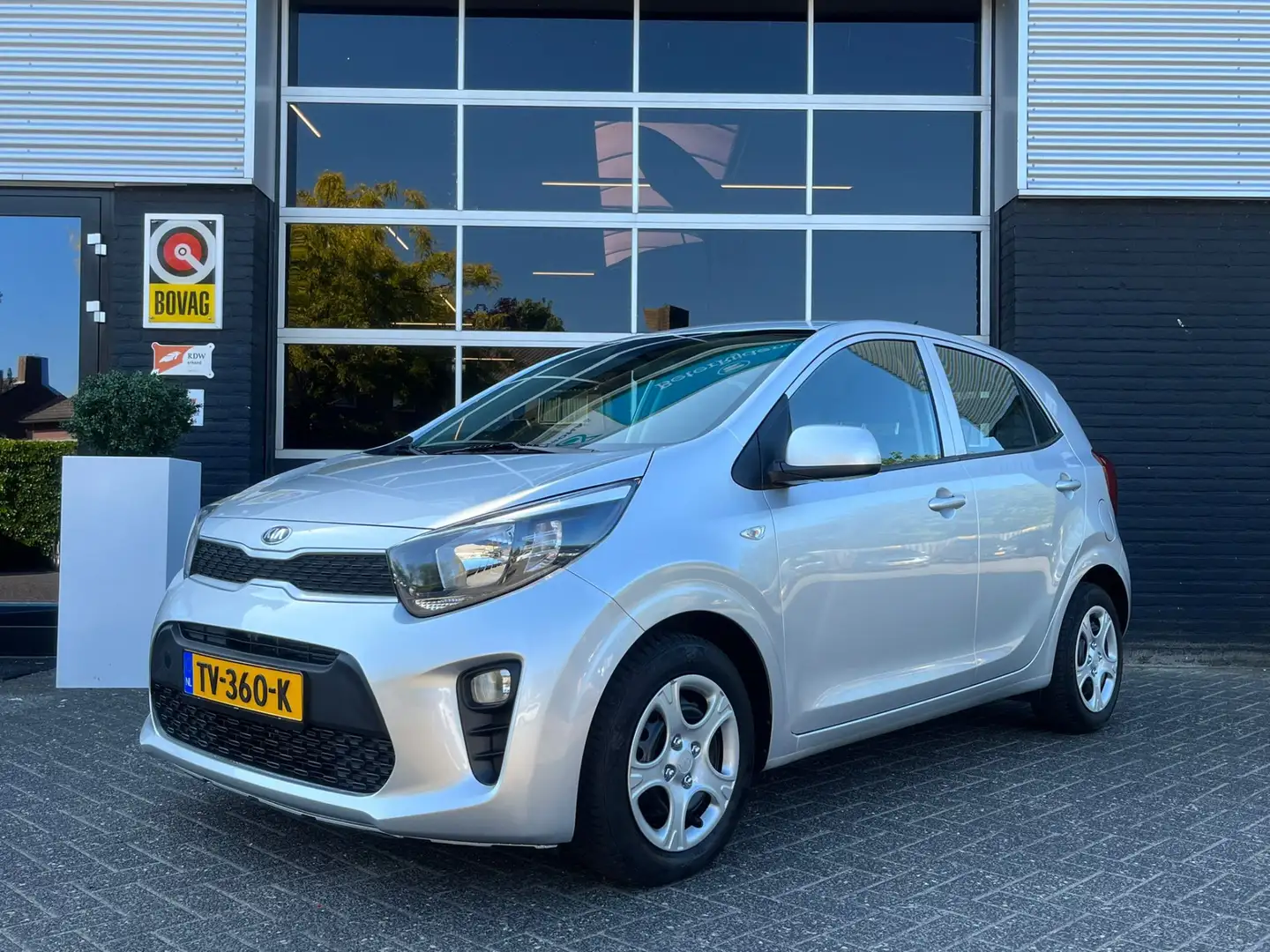 Kia Picanto 1.0 CVVT EconomyPlusLine, Airco, Bluetooth, Radio, Gris - 1