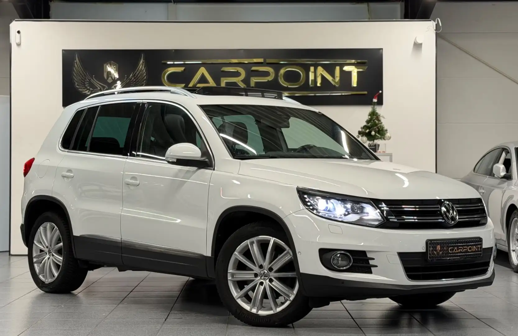 Volkswagen Tiguan Sport & Style BMT Aut/Bi-Xenon/Pano/Leder Wit - 1