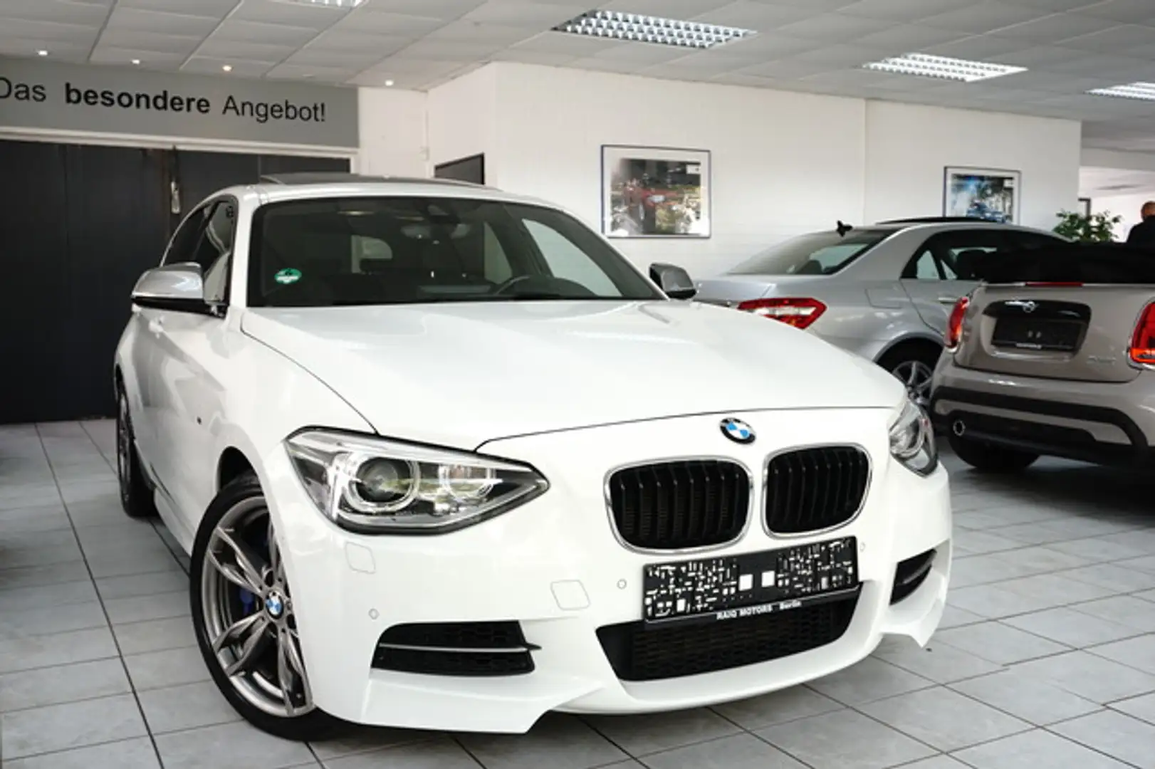 BMW 135 Mi xDrive Sport-Aut. ADAPTIVE FW NAVI H&K Bianco - 1
