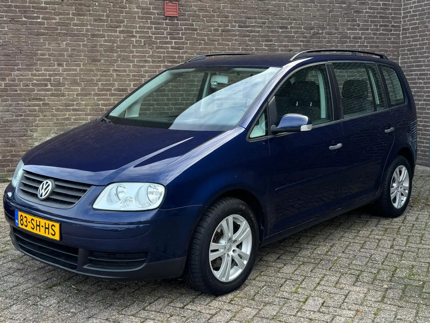Volkswagen Touran 1.6-16V FSI Business Clima Cruise-Contr. Bluetooth Blauw - 1