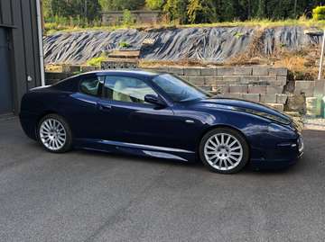 GT