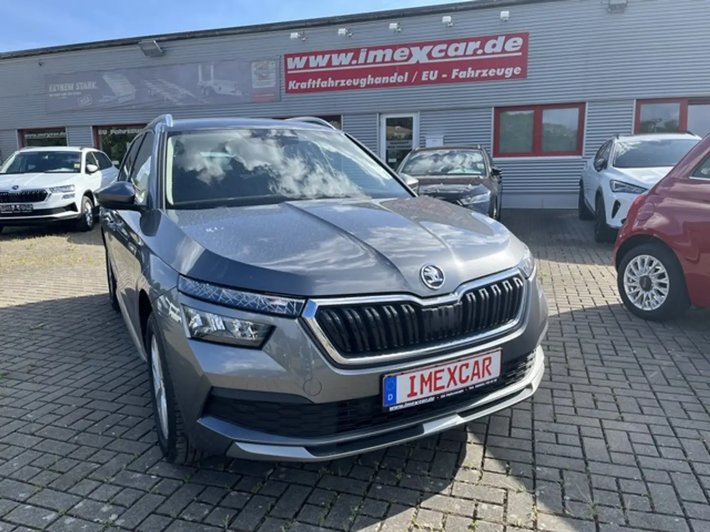 Skoda Kamiq 1,0 TSI Style + Sitzheizung + Kamera +  PDC + Klim Gris - 1