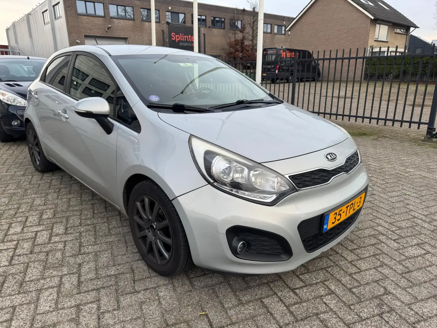 Kia Rio 1.2 CVVT Super Pack Airco,led,PDC Beige - 1