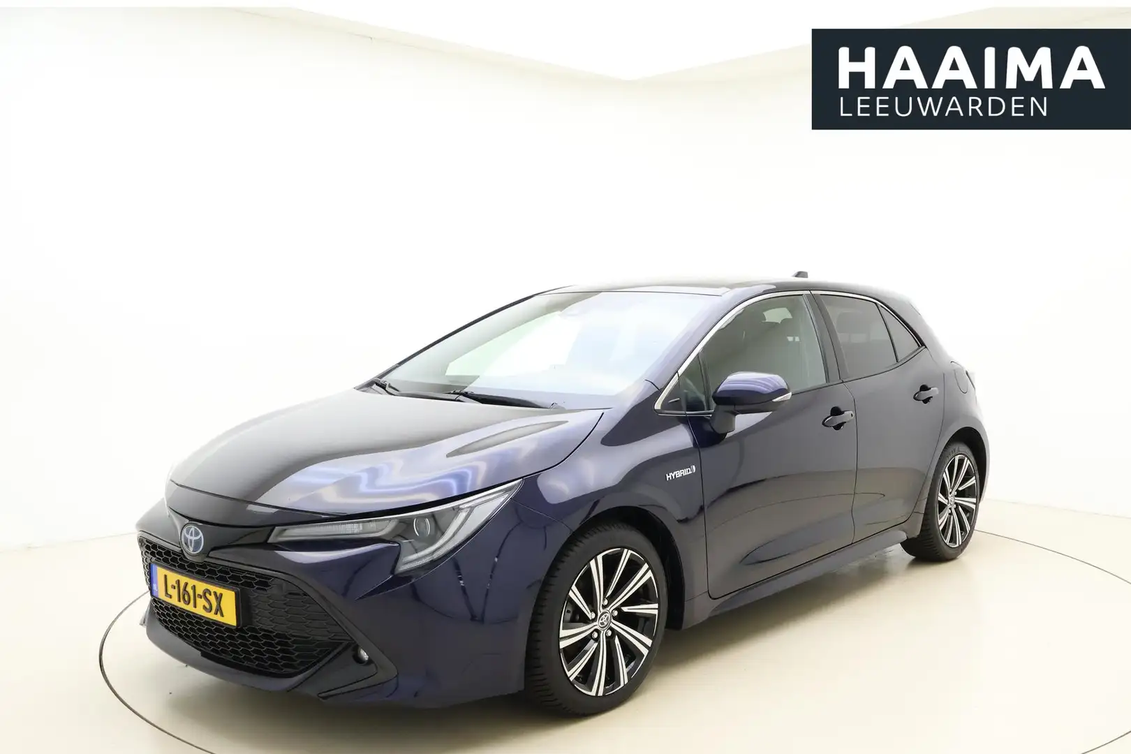 Toyota Corolla 1.8 Hybrid Dynamic | Navigatie via Carplay | LED v Blauw - 1