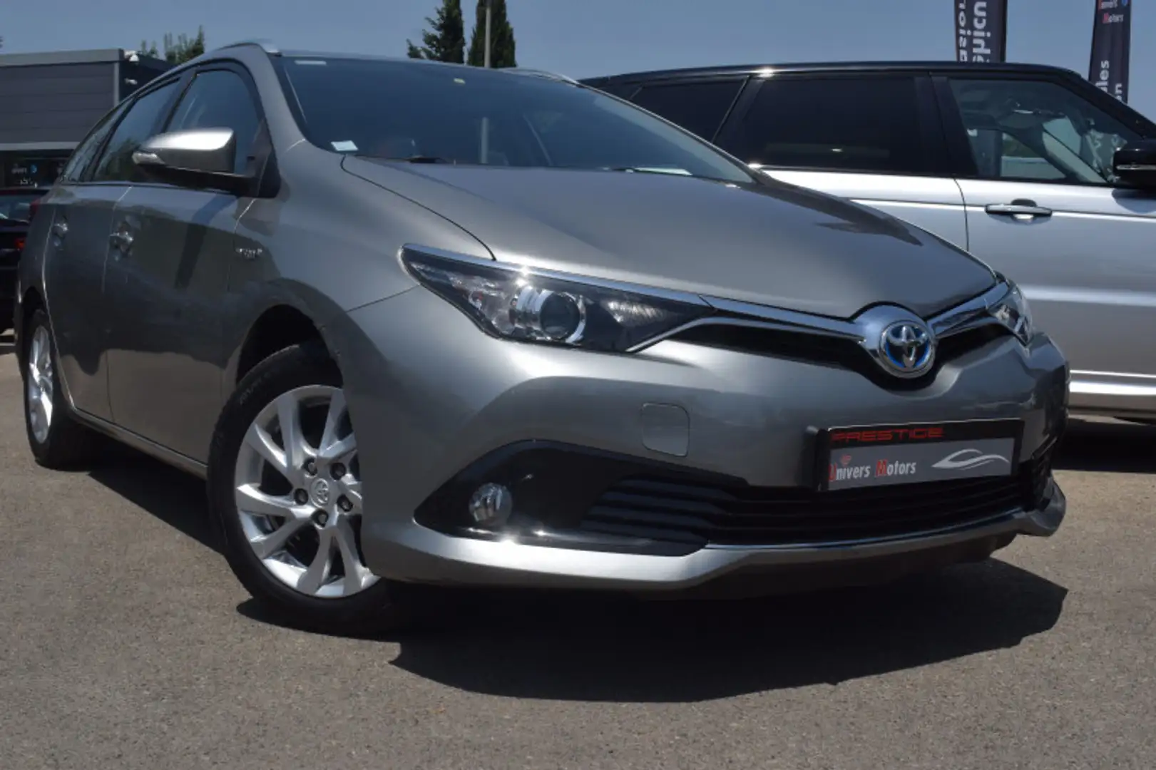 Toyota Auris HSD 136H DYNAMIC Gris - 1