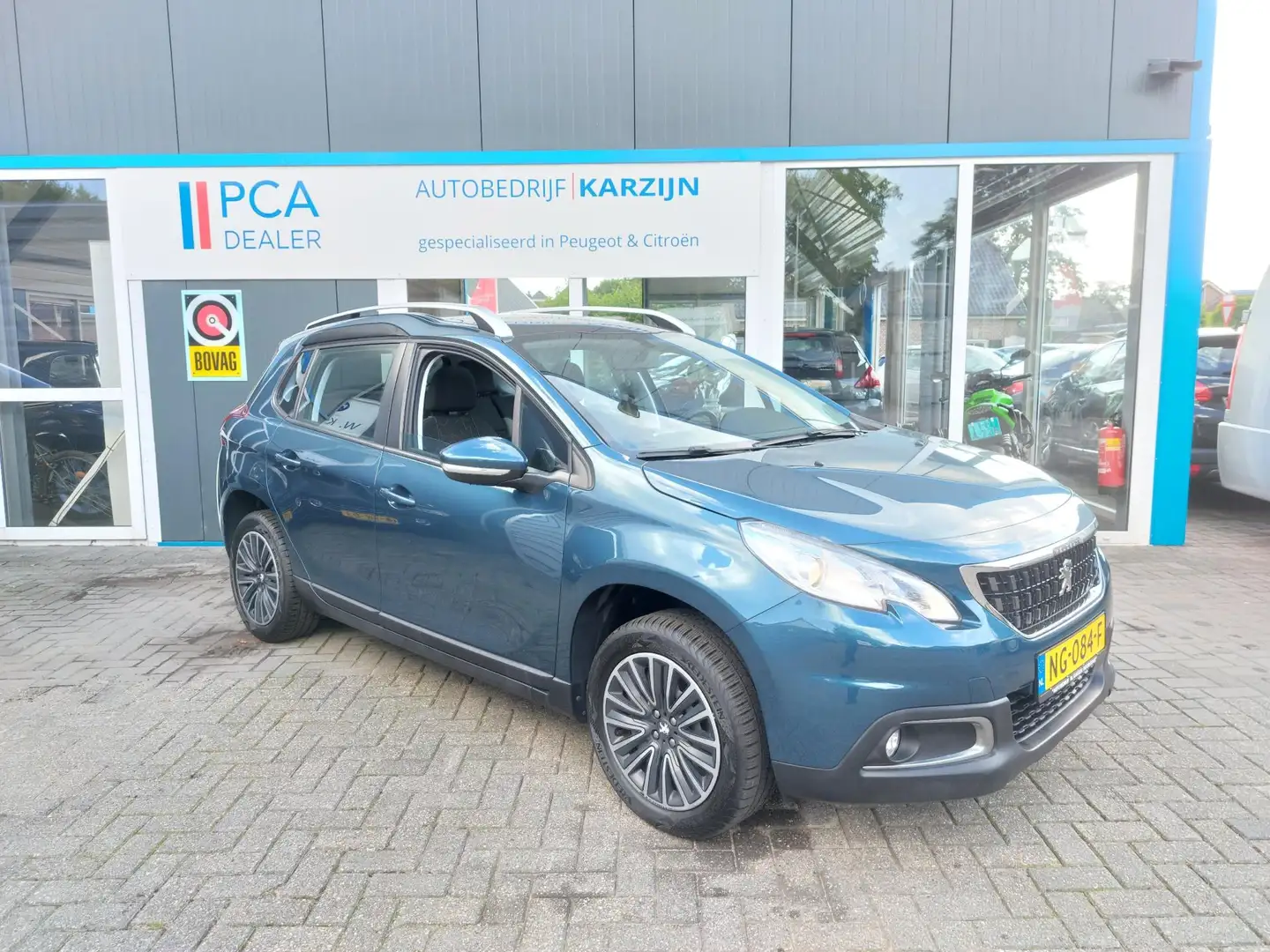 Peugeot 2008 1.2 PureTech Blue Lion Groen - 2