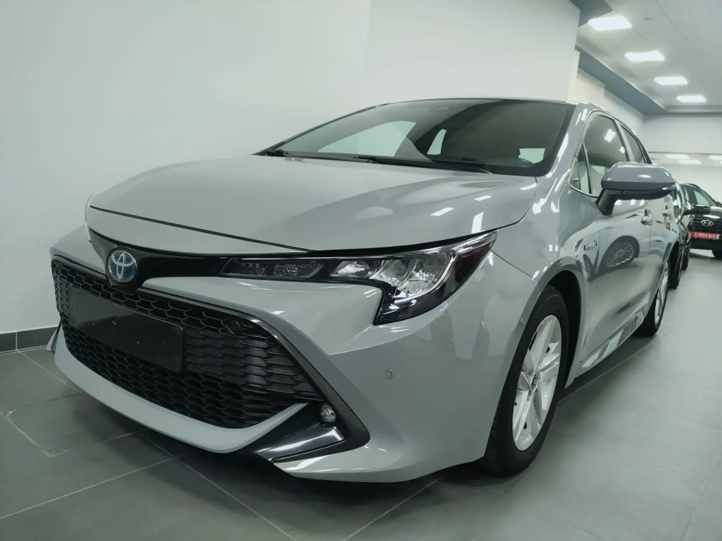 Toyota Corolla 125H Business Gris - 1