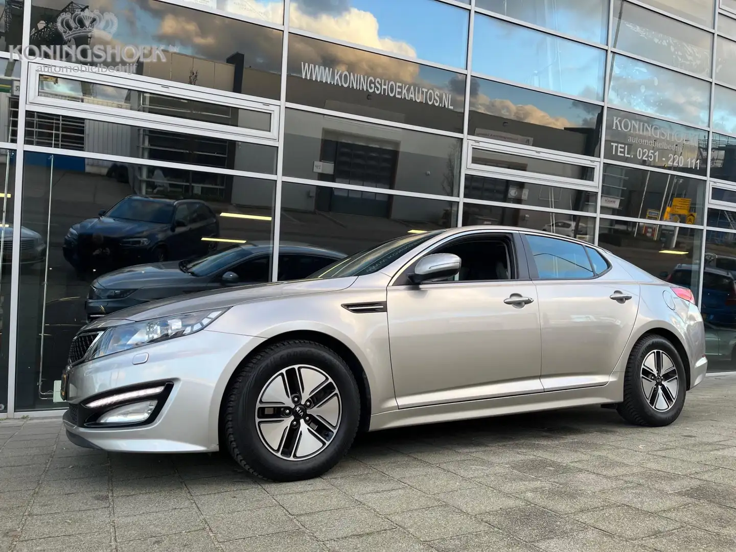 Kia Optima 2.0 CVVT Hybrid Plus Pack Grijs - 1