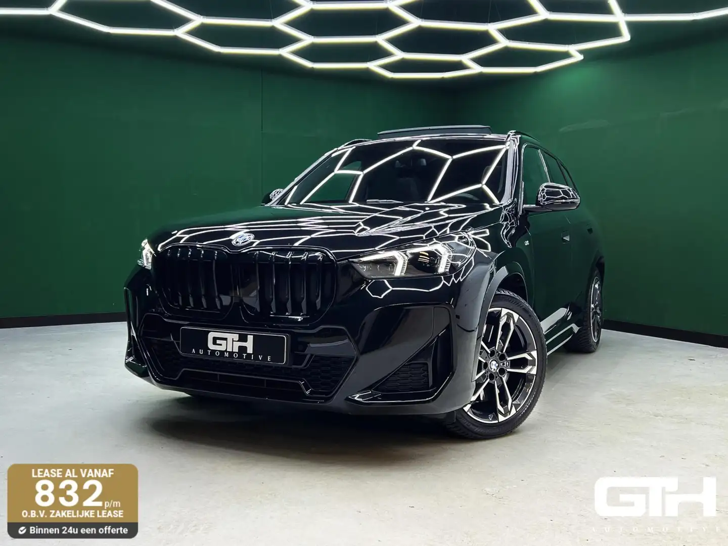 BMW X1 sDrive20i M-Sport Pro | Lane | Pano | Trekhaak Zwart - 1
