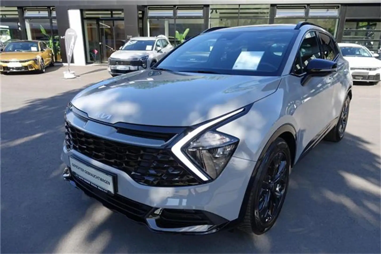 Kia Sportage 1,6 TGDI 48V Anniversary AWD DCT Grau - 1