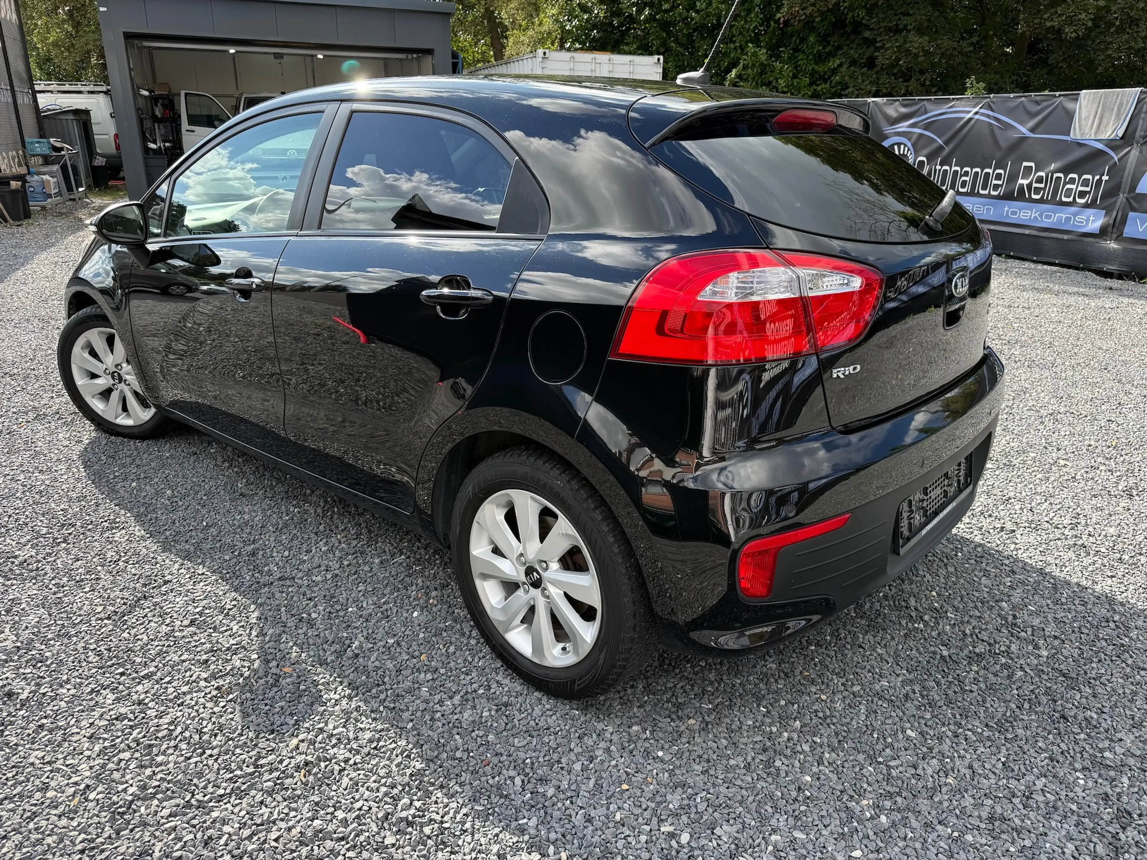Kia Rio Rio 1.2i Lounge, Airco, Navigatie, Pdc + 12M Garantie — photo 4