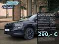 Skoda Karoq Sportline 1.5 TSI DSG KESSY V-COCK NAVI Zwart - thumbnail 1