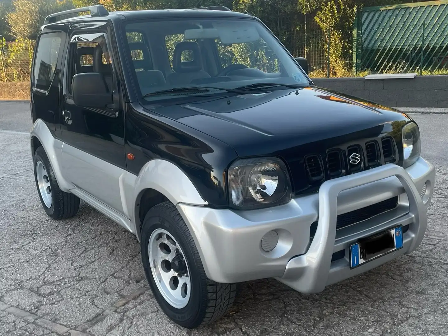 Suzuki Jimny Jimny III 1997 1.3 16v JLX 4wd E3 Чёрный - 1