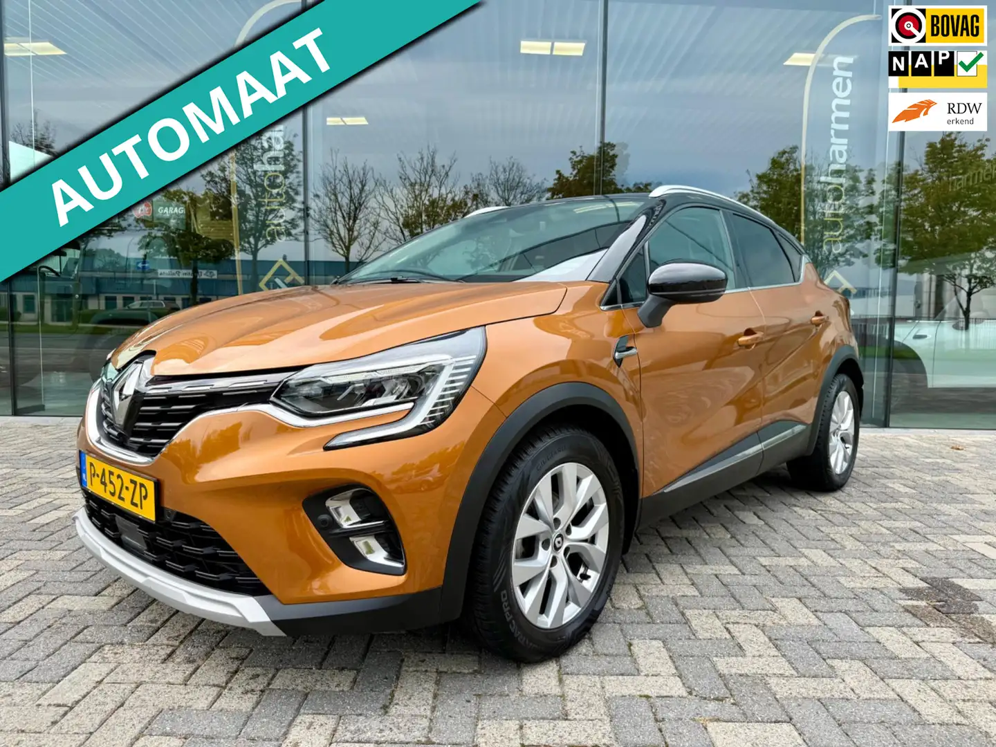 Renault Captur 1.3 TCe 140 automaat Hybrid Intens, CarPlay, LED, Orange - 1