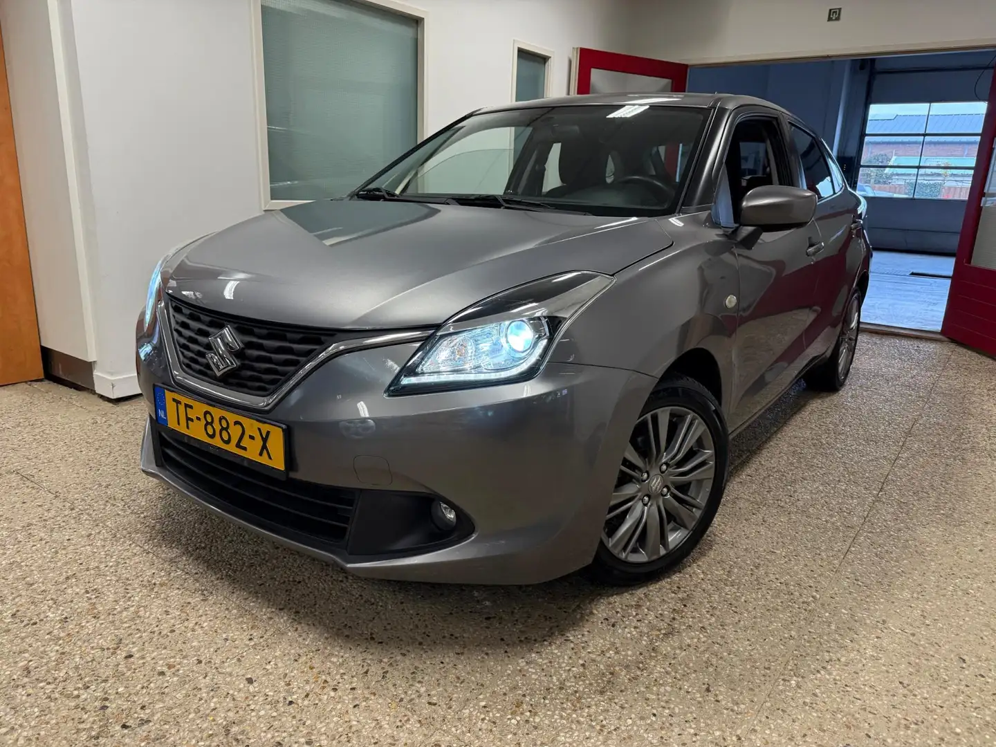 Suzuki Baleno 1.2 Exclusive | Trekhaak | All Season Grijs - 2