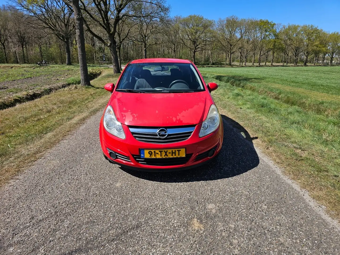 Opel Corsa 1.4-16V Enjoy Rood - 1