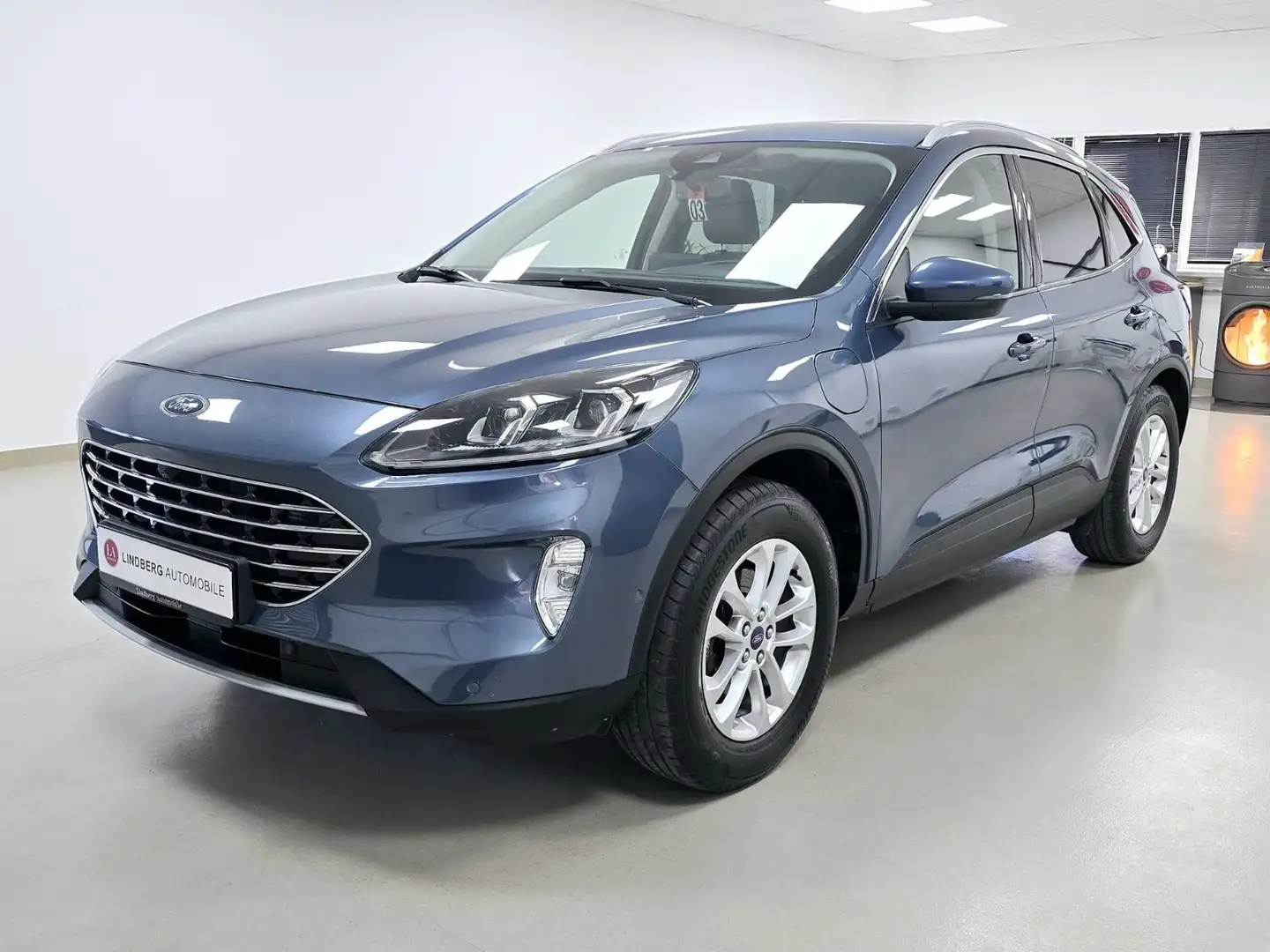 Ford Kuga Pl.-In Hybrid Titanium X*PDC*APP*8F*NAVI*AC Blau - 1