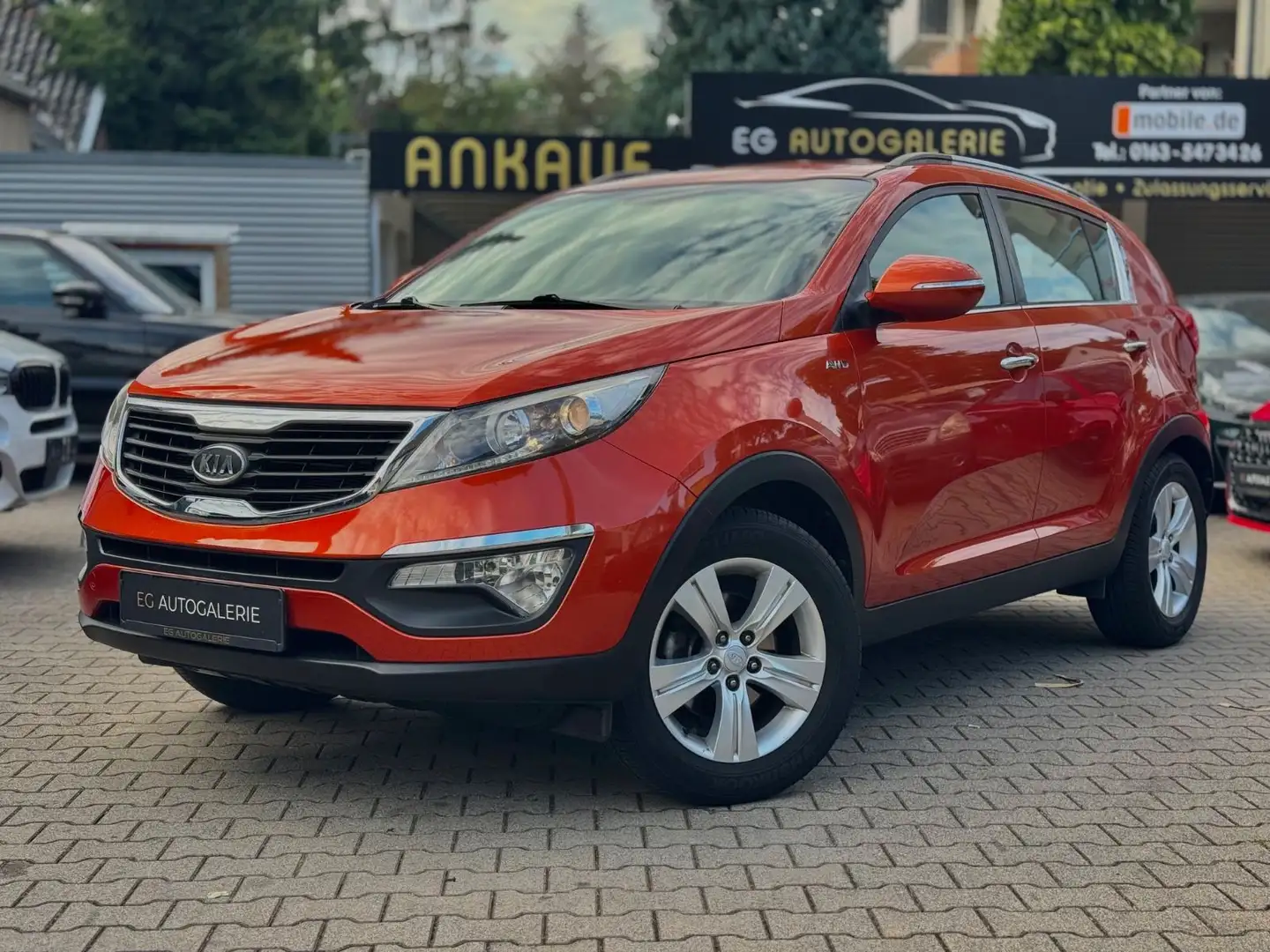 Kia Sportage Vision 4WD*1.HAND*KAMERA*XENON*APPLE-C* Portocaliu - 1