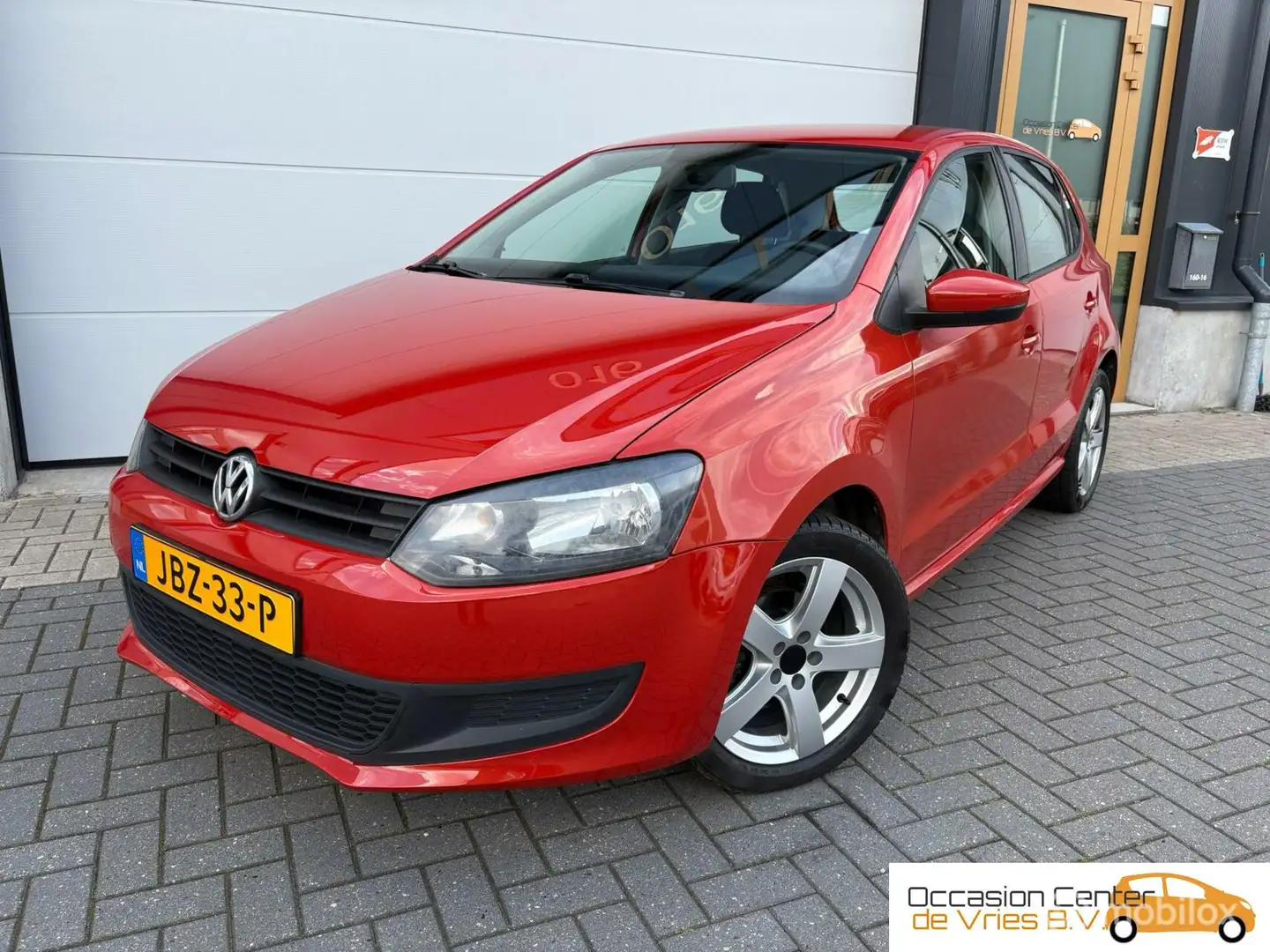 Volkswagen Polo 1.2 5drsAircoNaviBluetoothElektrPakketVelgen Oranje - 1
