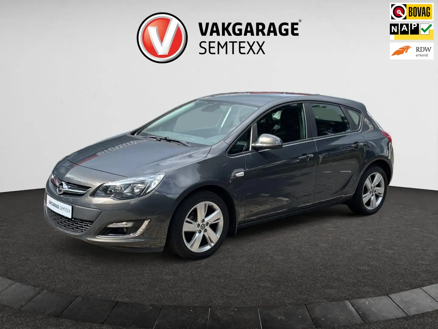 Opel Astra 1.4 Berlin | Airco | Cruise | IsoFix | Trekhaak | Grijs - 1