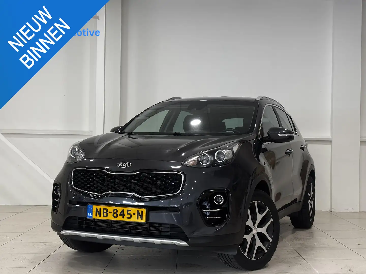 Kia Sportage 1.6 GDI First Edition | Lederen bekleding | Naviga Gris - 1