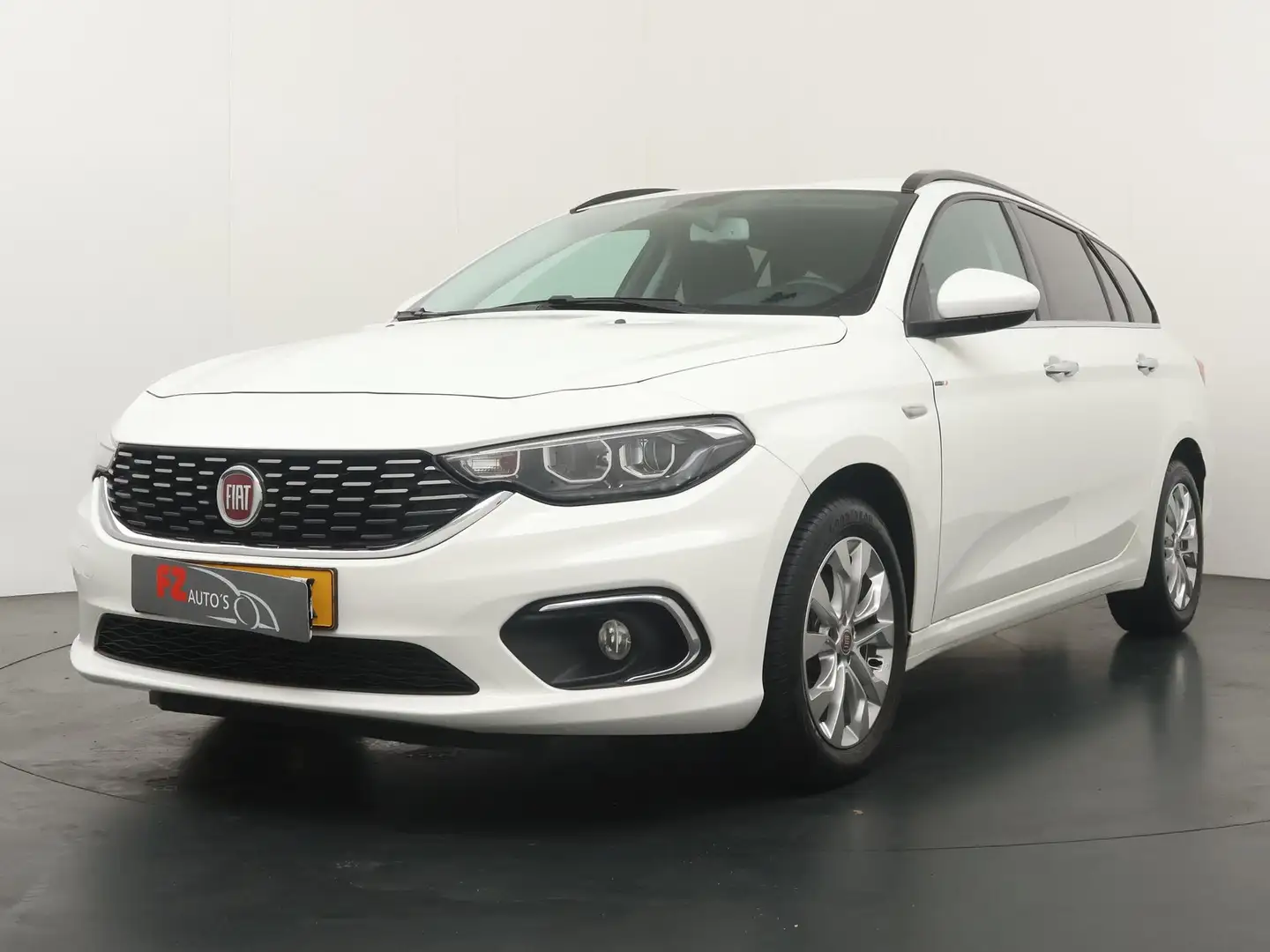 Fiat Tipo Stationwagon 1.4 T-Jet 16v Business Lusso - Naviga Wit - 1