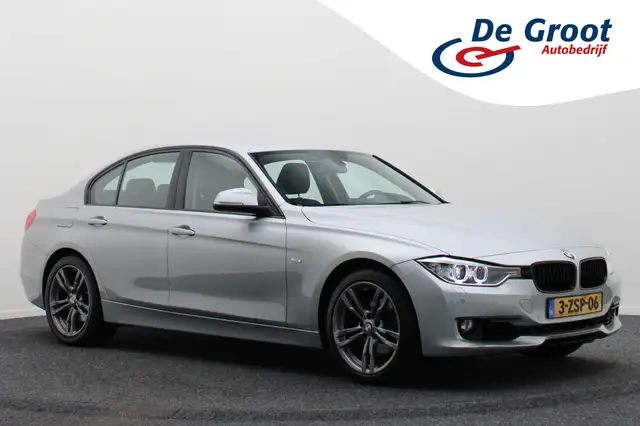BMW 320 3-serie 320i High Executive Leer, H&K, Navigatie,