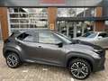 Toyota Yaris Cross 1.5 Hybrid 130 Executive + FABRIEKSGARANTIE Grau - thumbnail 1