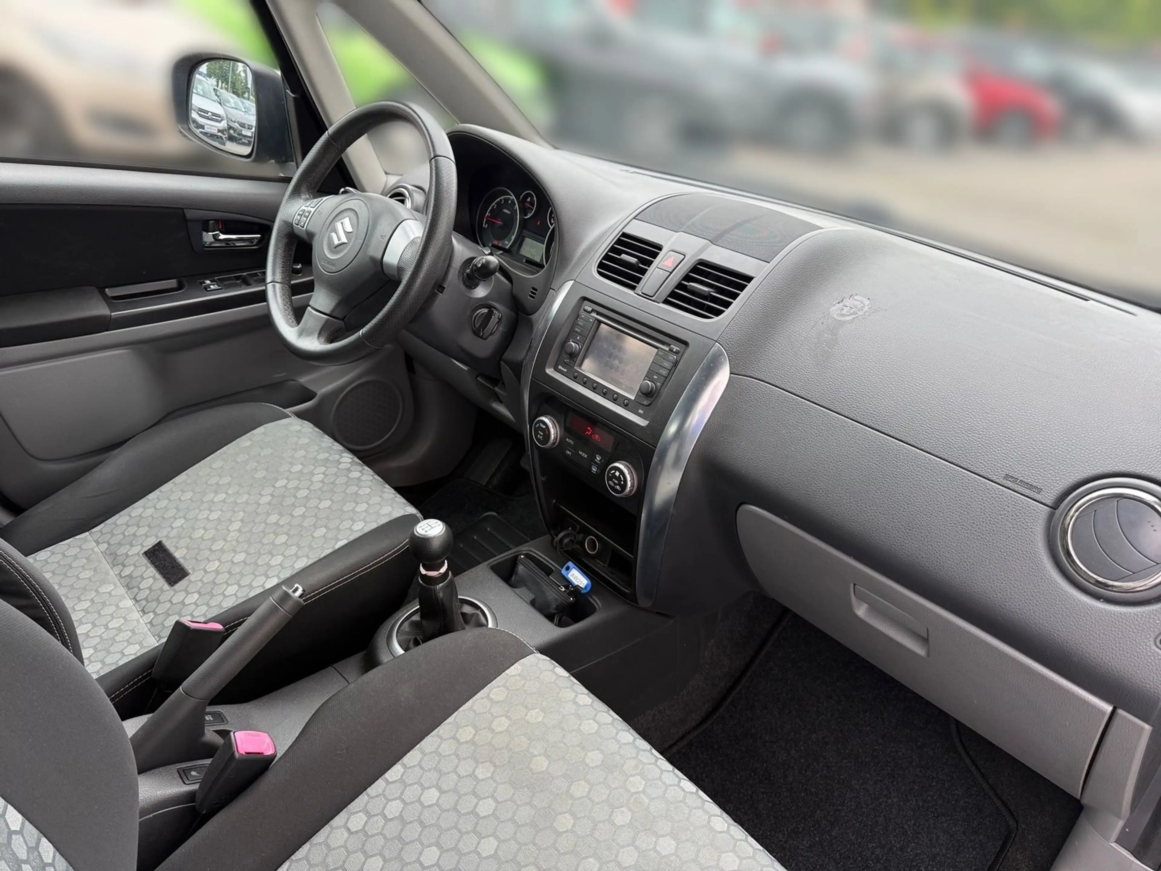 Suzuki SX4 1.6 City+ — photo 14