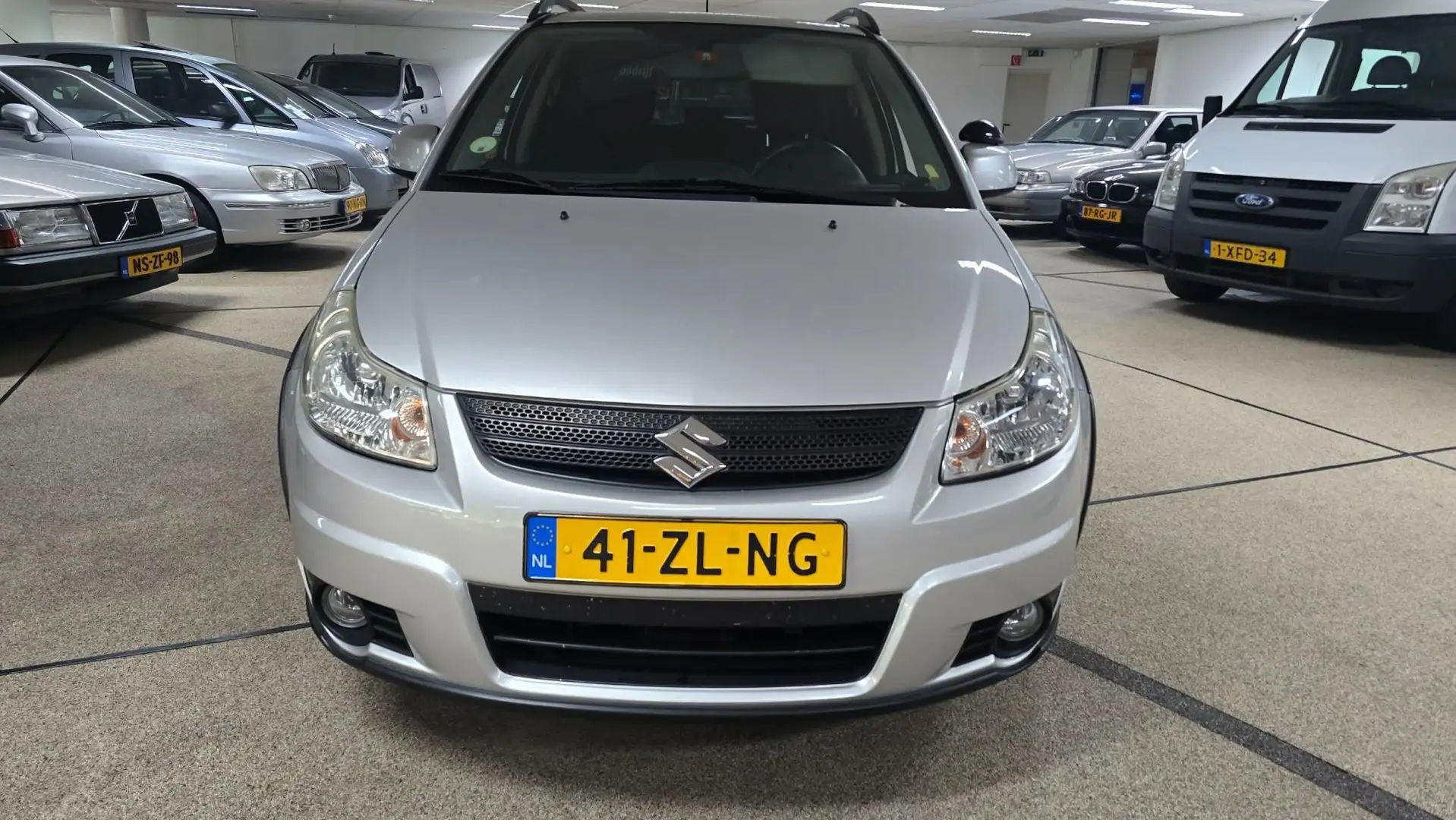 Suzuki SX4 1.6 Shogun zeer netjes Airco. Grijs - 2