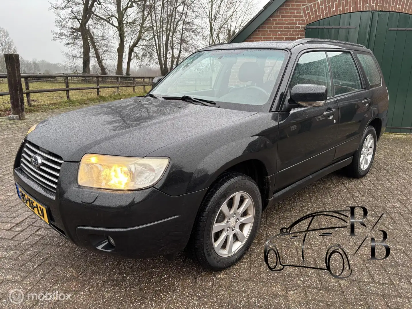 Subaru Forester 2.0 X Comfort Pack AWD MOOIE AUTO AIRCO Schwarz - 1
