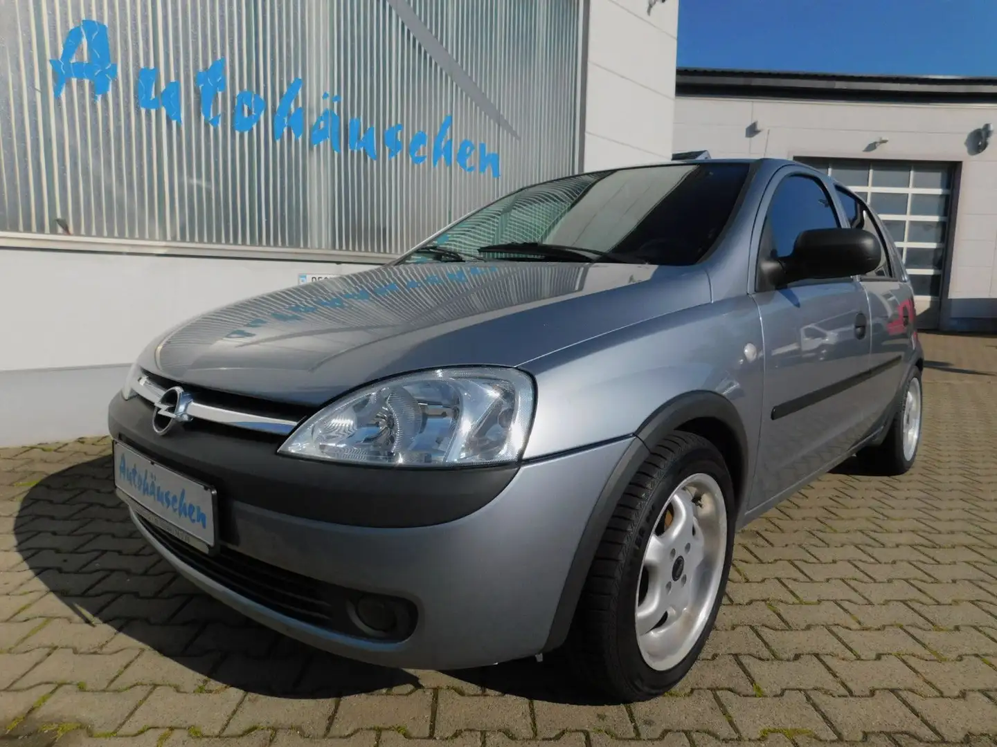 Opel Corsa 1.0 12V Eco LMF/NSW/Servo/erst 83tkm Silber - 1