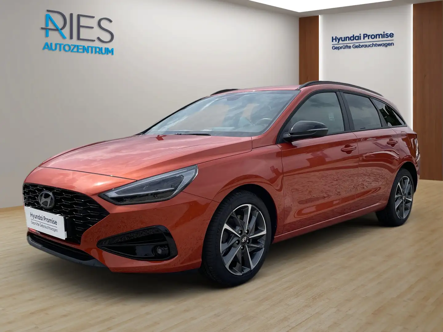 Hyundai i30 cw 1.0 T-GDI Advantage *Navi*KlimaA*LED*SHZ Orange - 1