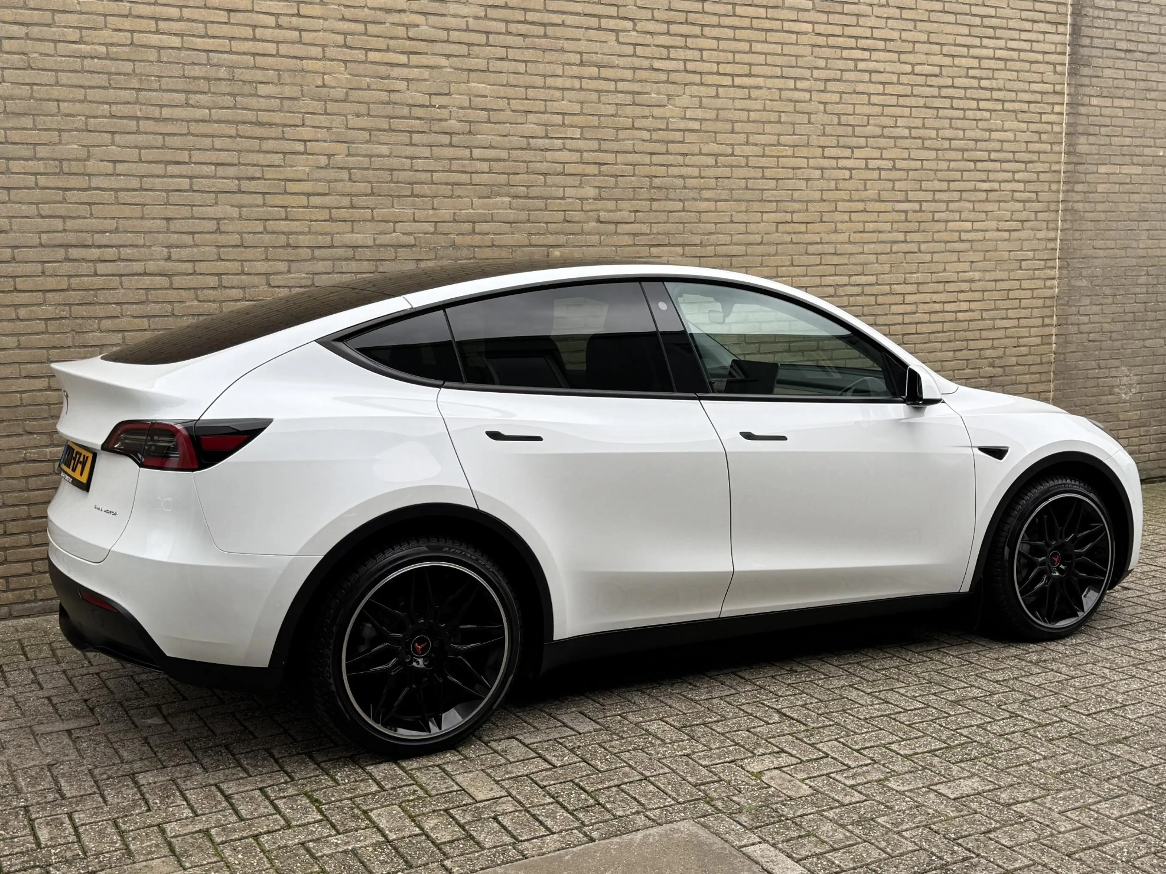 Tesla Model Y Long Range AWD 75 kWh SOH 93% | Lederen bekleding — photo 25