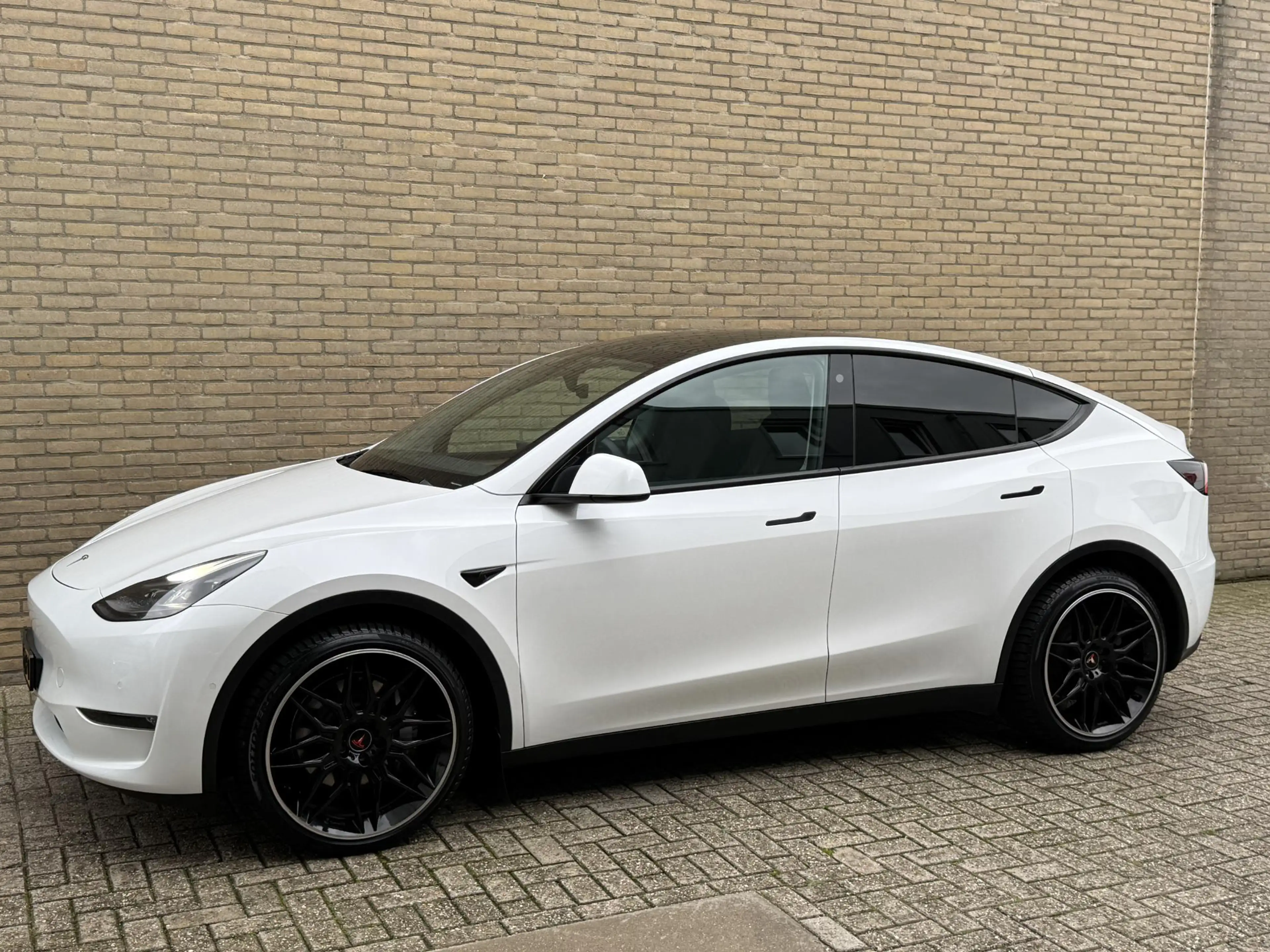 Tesla Model Y Long Range AWD 75 kWh SOH 93% | Lederen bekleding — photo 22