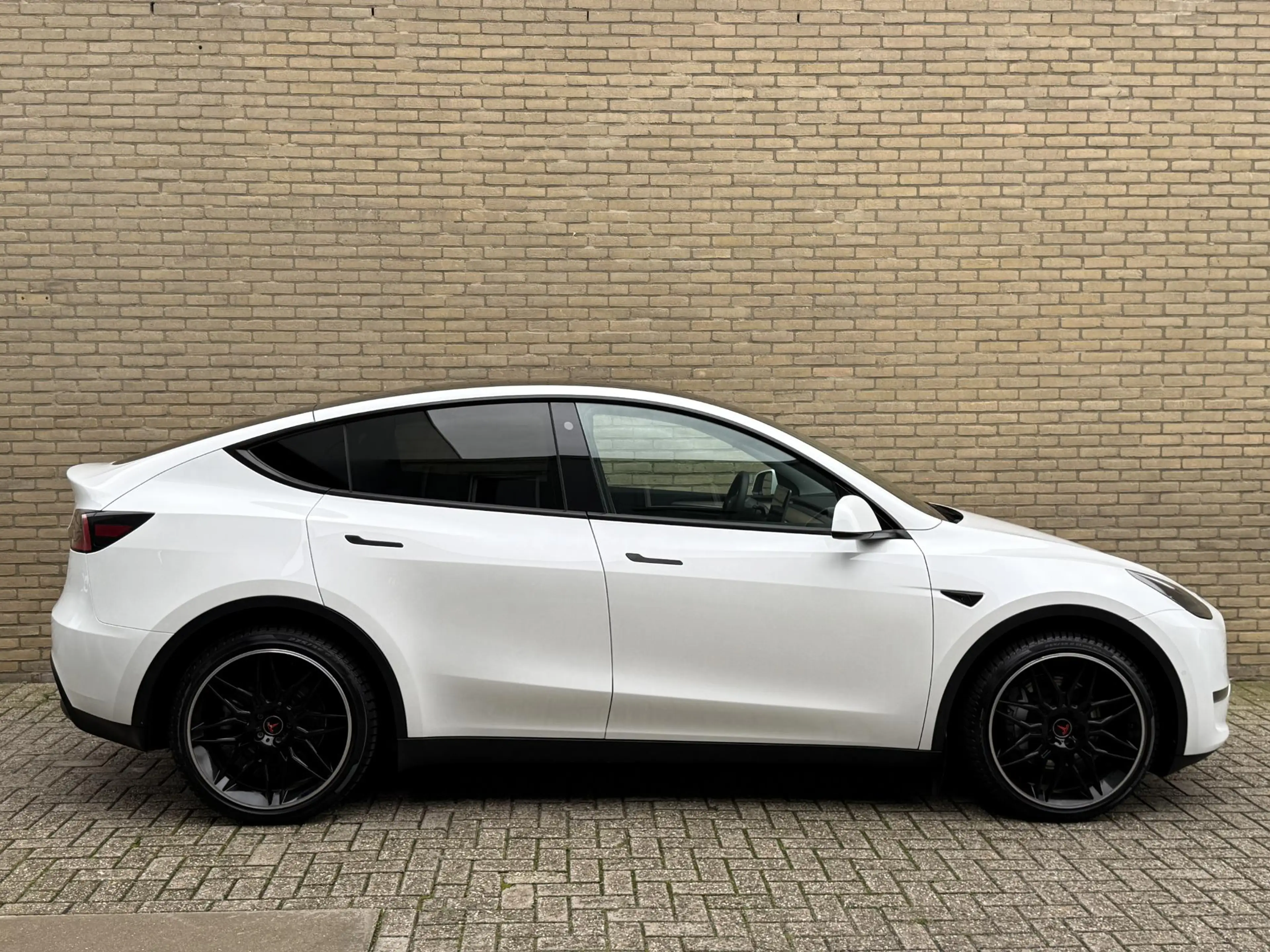 Tesla Model Y Long Range AWD 75 kWh SOH 93% | Lederen bekleding — photo 26