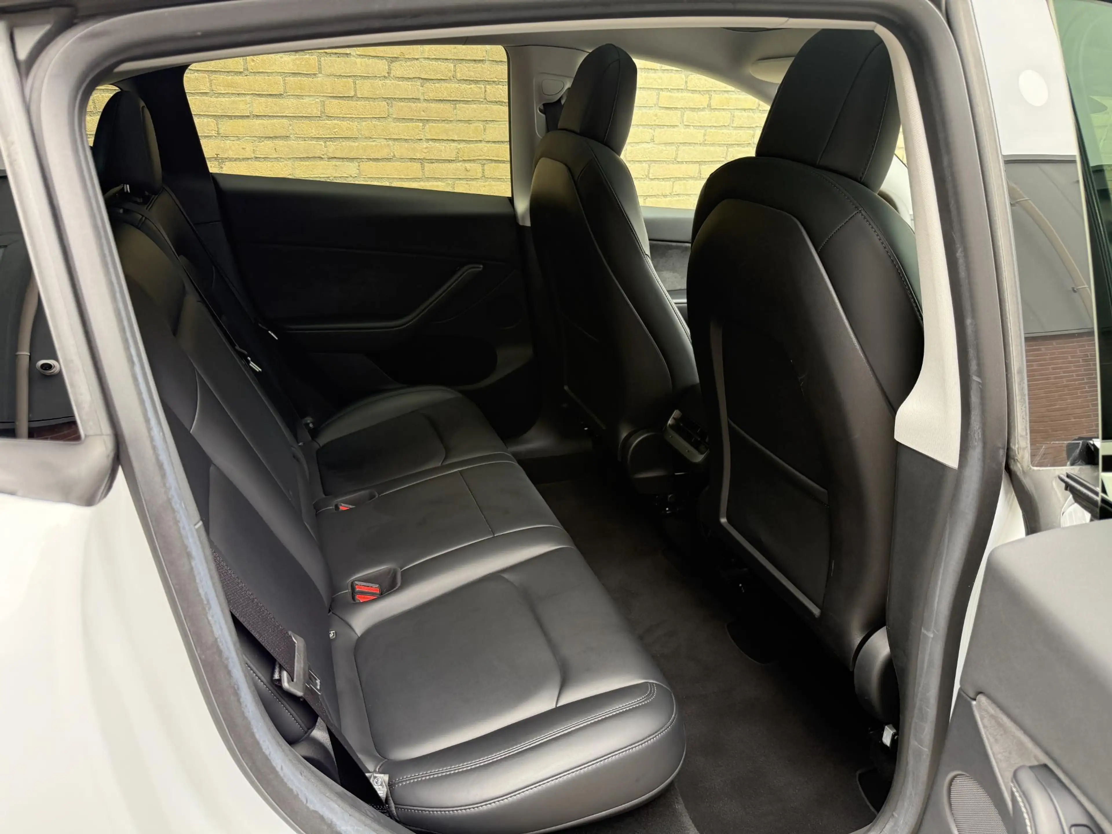 Tesla Model Y Long Range AWD 75 kWh SOH 93% | Lederen bekleding — photo 14