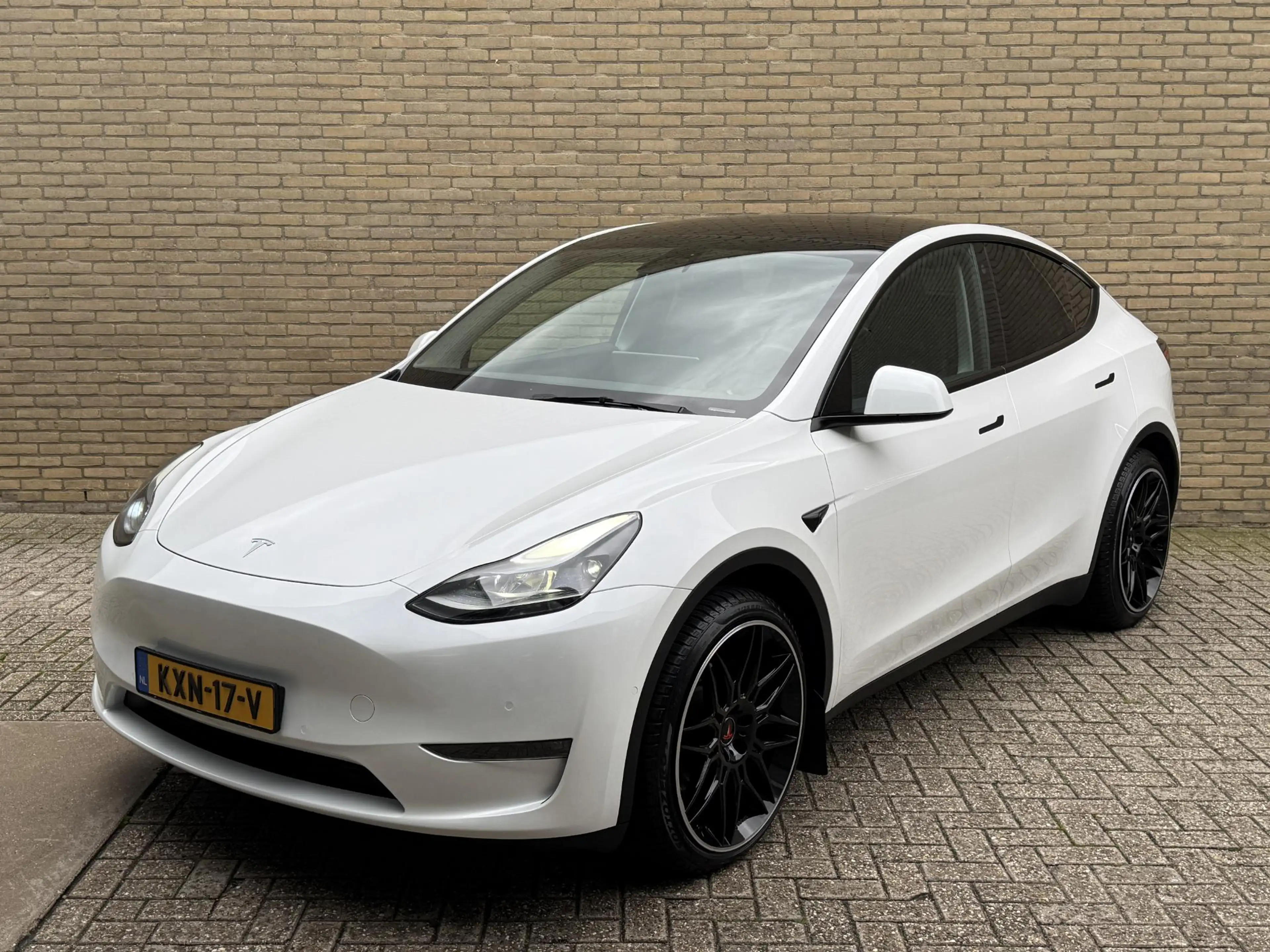Tesla Model Y Long Range AWD 75 kWh SOH 93% | Lederen bekleding — photo 21