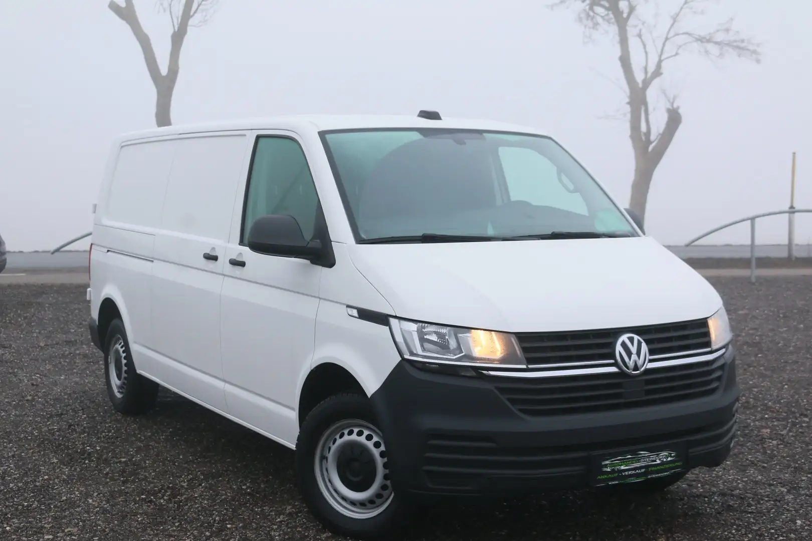 Volkswagen T6.1 Transporter Lang*Kamera*Navi*Flügeltüre*2X Parkhilfe Weiß - 1