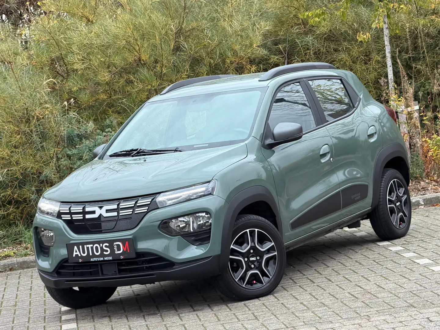 Dacia Spring Spring Leder, Navi, Camera, Airco, Cruise, PDC A Groen - 1