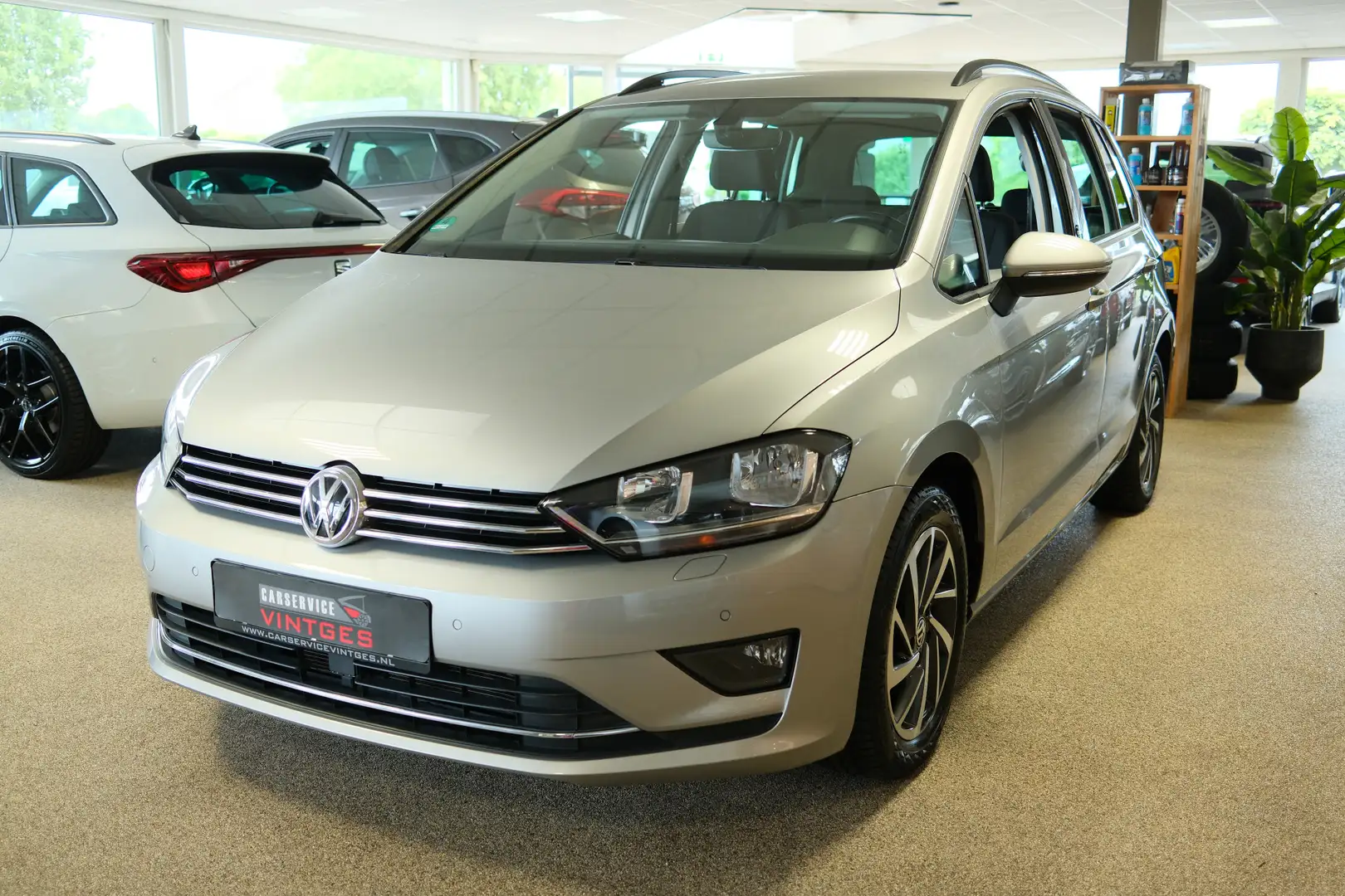 Volkswagen Golf Sportsvan 1.4 TSI DSG 122pk Highline Sound !! PDC/CARPLAY/NA Gris - 1