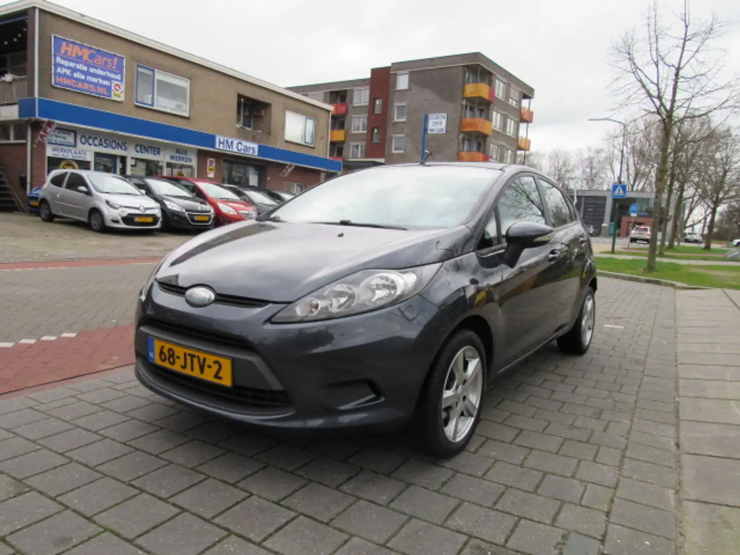 Ford Fiesta 1.25 60pk 5Drs Airco Limited Grijs - 1