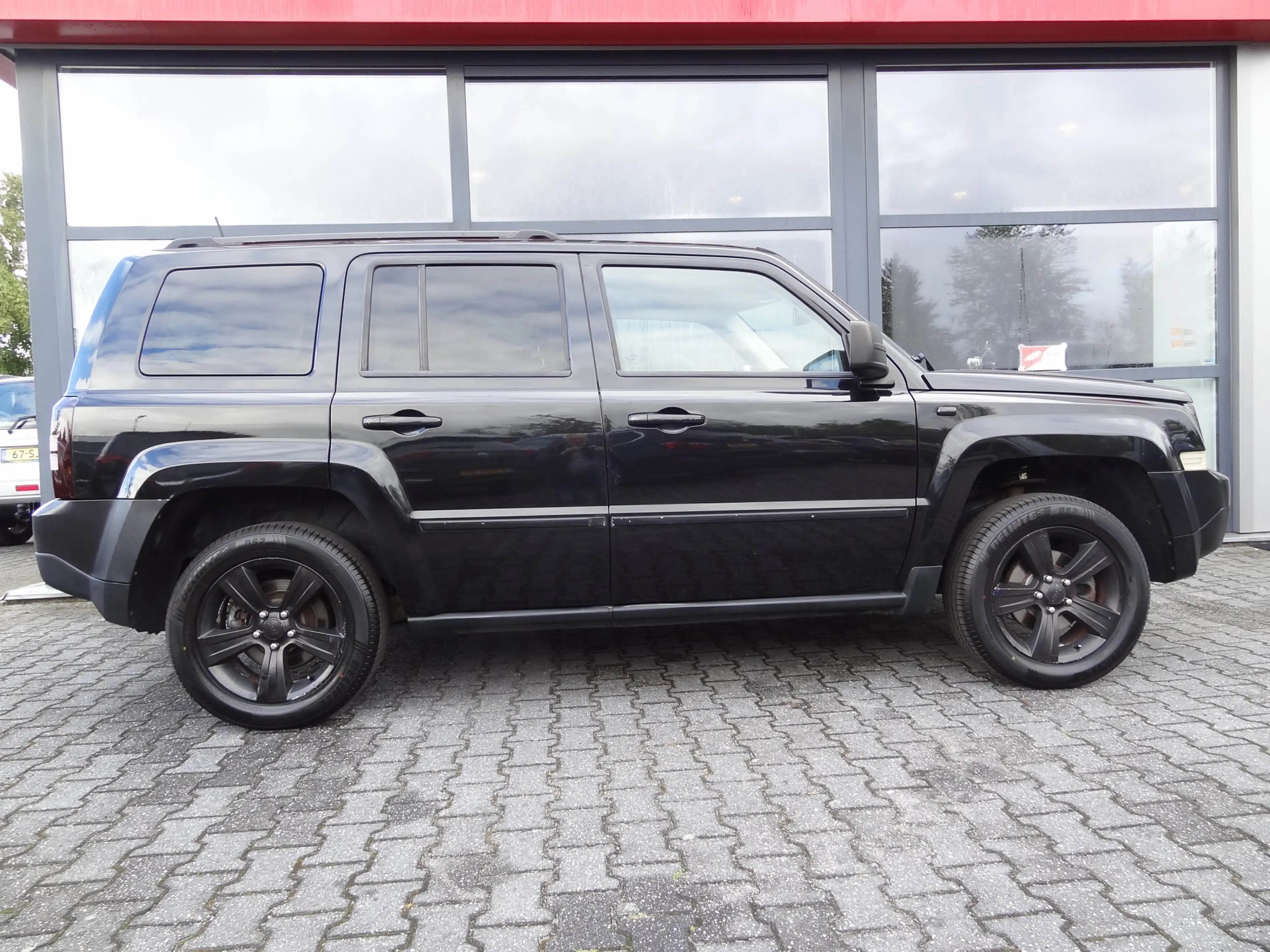Jeep Patriot 2.4 Limited Liberty | NL-AUTO | CRUISE | 4x4 | AIR — photo 9