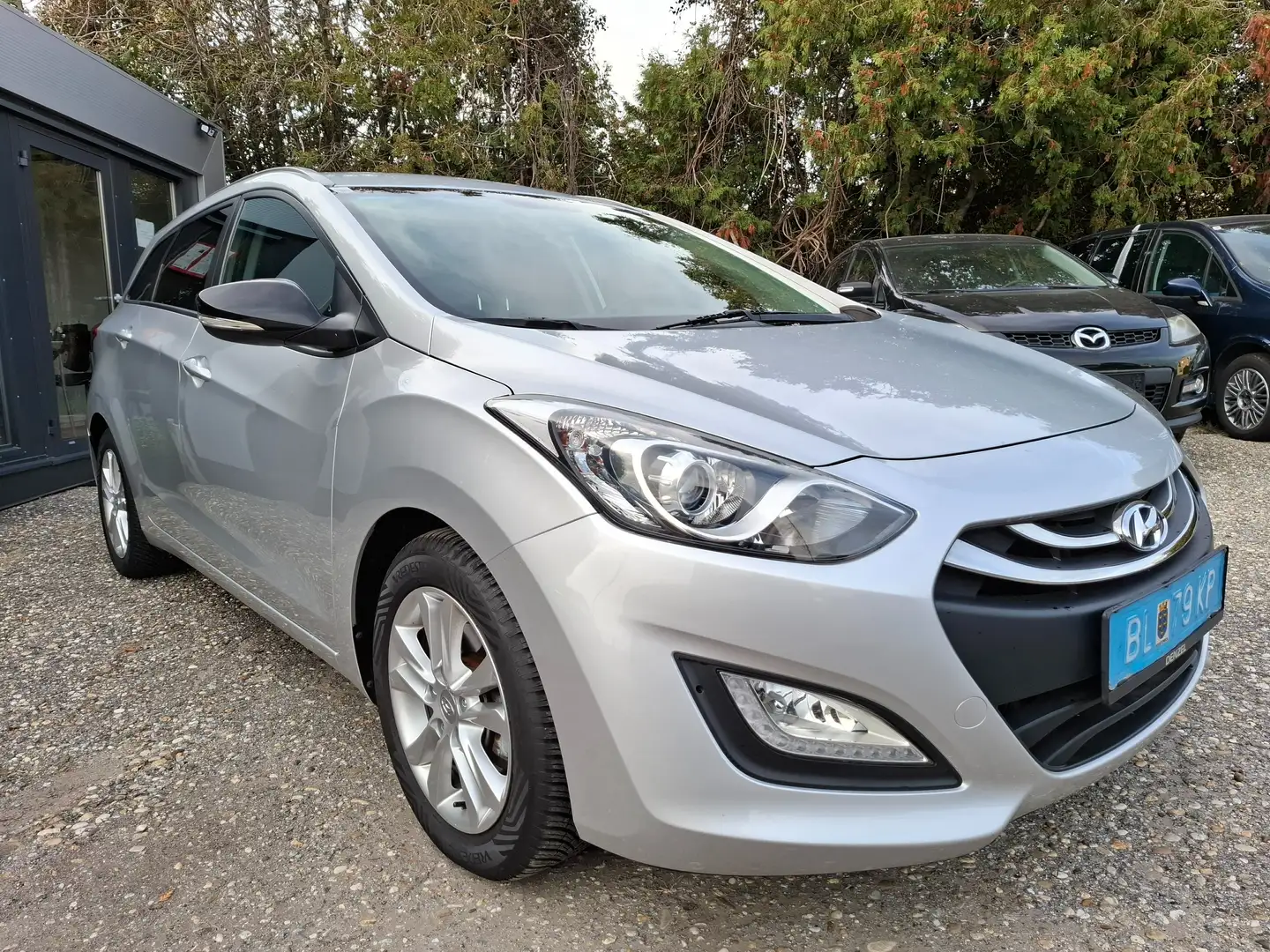 Hyundai i30 CW 1,4 Classic Kombi+1.Besitz+Bluetooth,Sitzheiz. Silber - 1