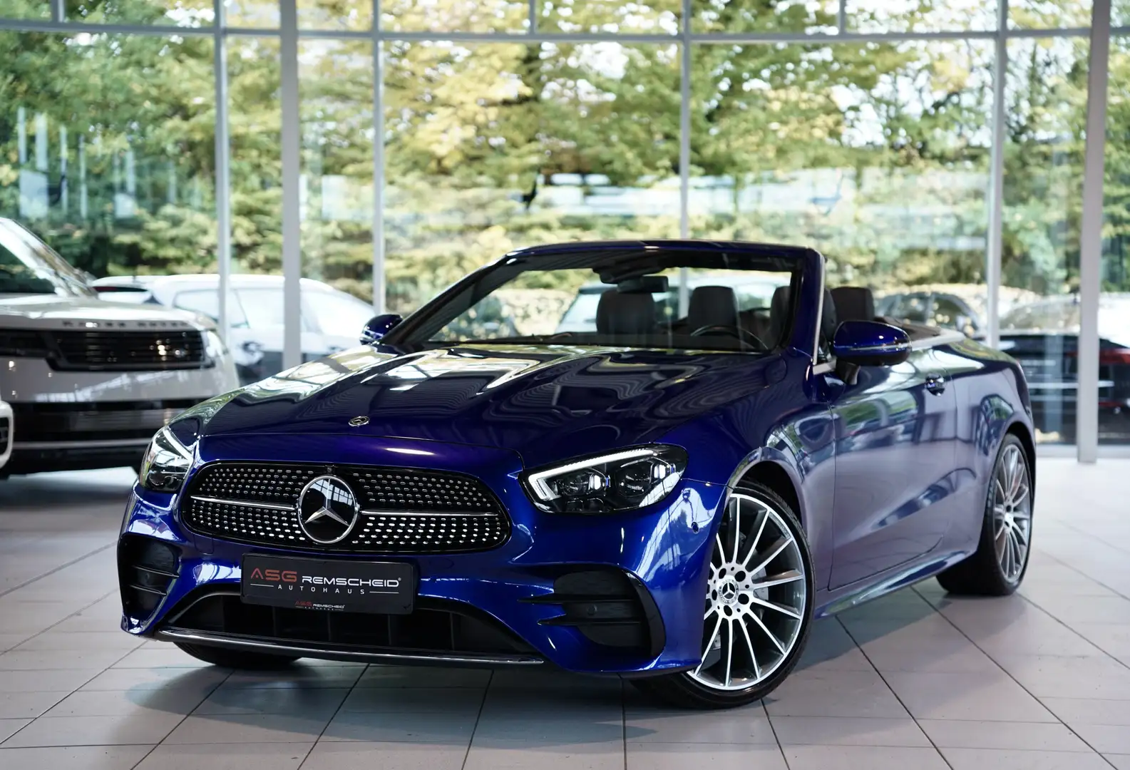 Mercedes-Benz E 220 d Cabrio AMG line *2.H *20 *Distr.*Memory Blau - 1