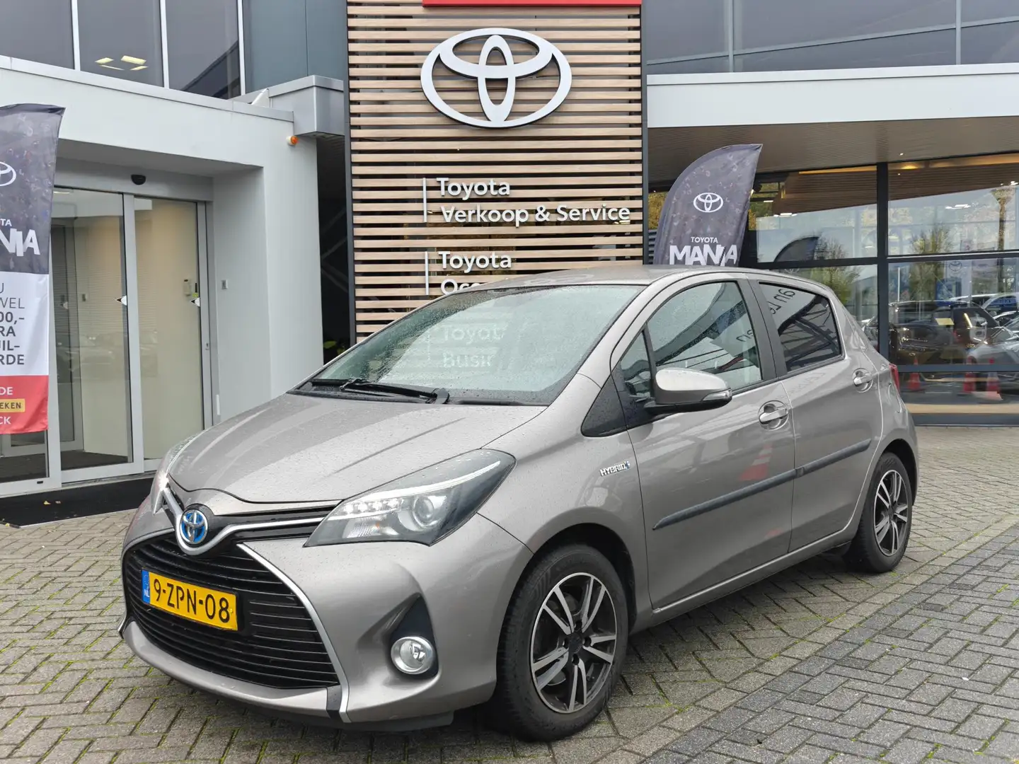 Toyota Yaris 1.5 HYBRID LEASE 5-DEURS NAVI BLUETOOTH CAMERA CRU Brun - 1