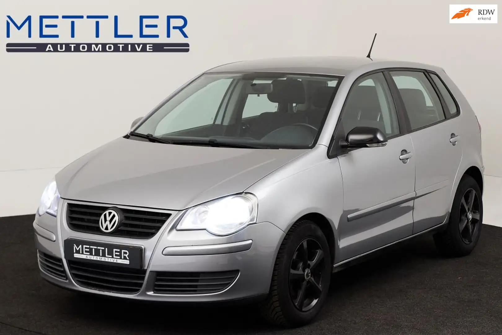 Volkswagen Polo 1.4-16V Optive Grijs - 1