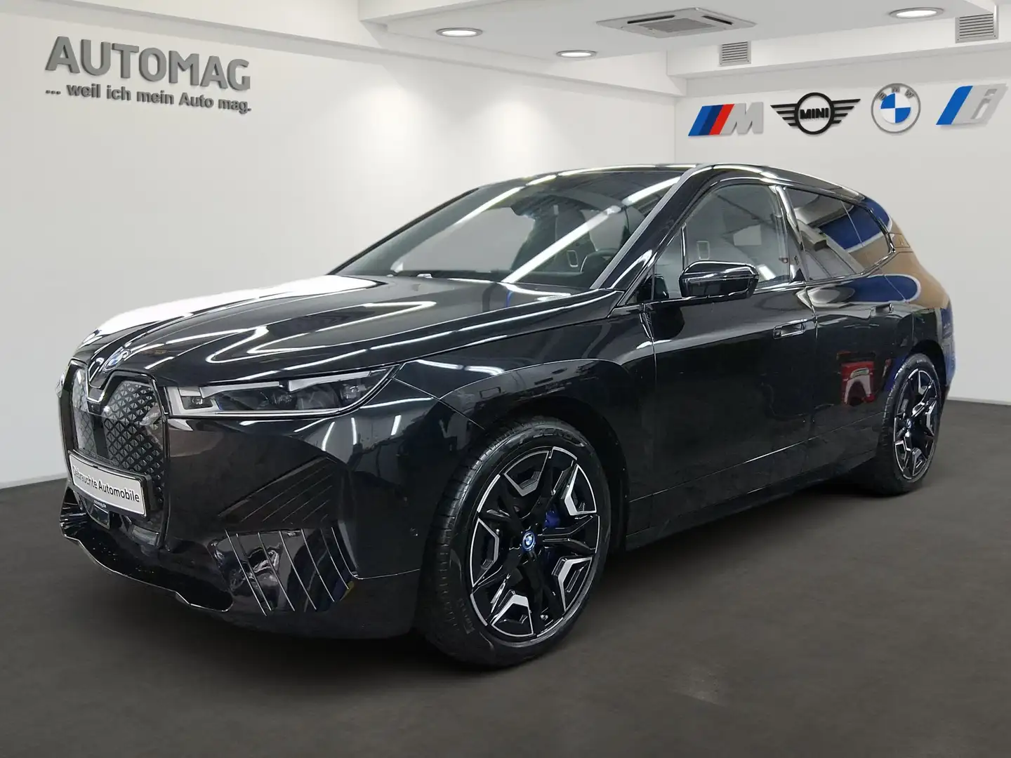 BMW iX xDrive40 AHK*Laser*SkyLounge*DriveAssistProf*ParkA Schwarz - 1