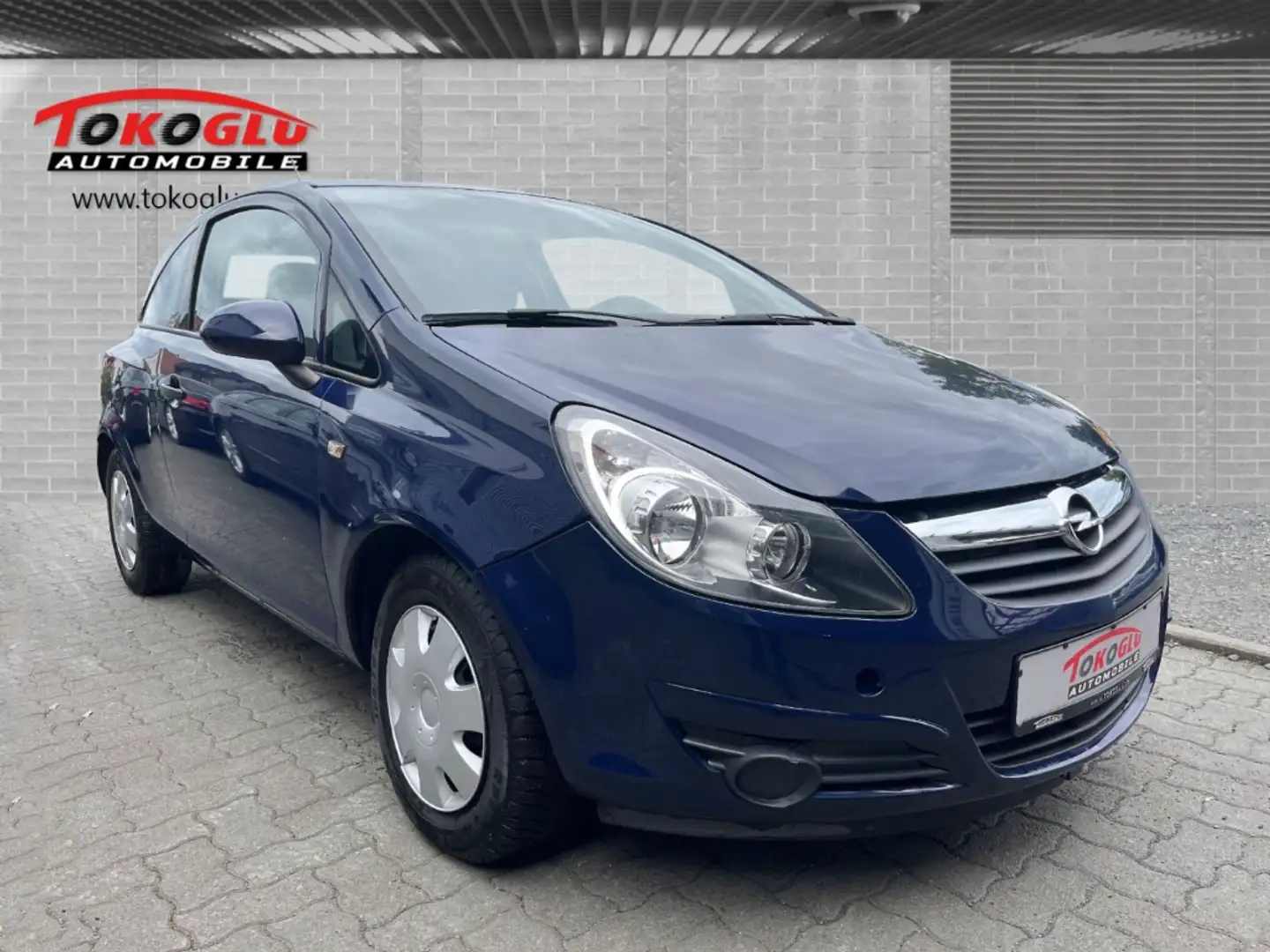 Opel Corsa D Selection 110 Jahre 1.0 Klima  el.SP CD Radio ZV Blauw - 1